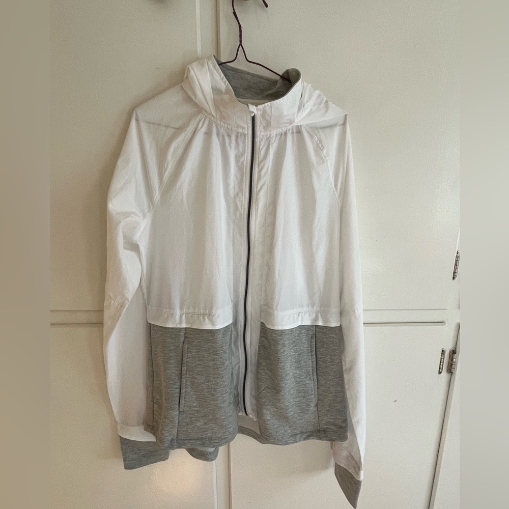 Never worn Avia light windbreaker, white/grey. Size Medium.m(8-10)